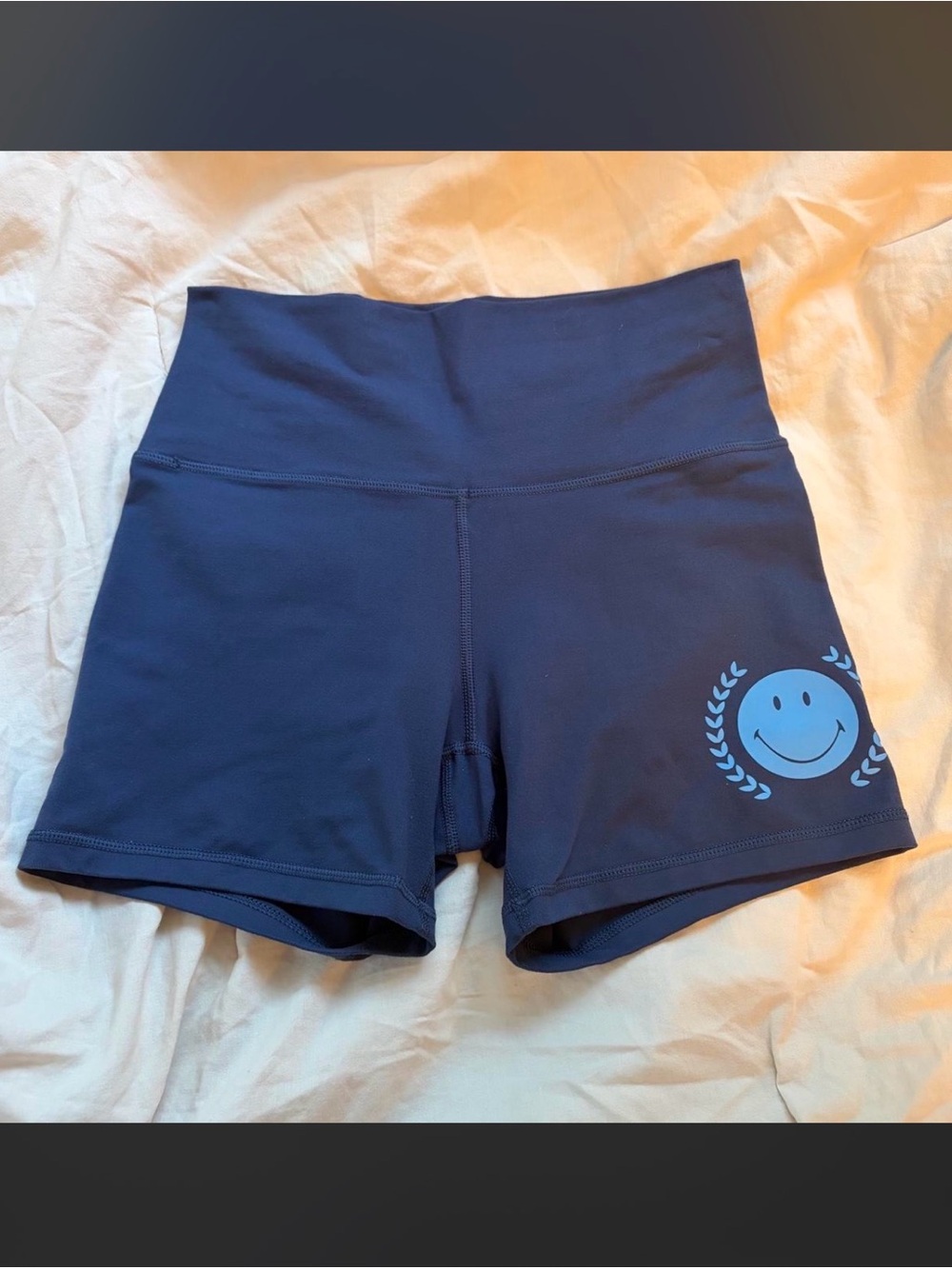 Aerie Navy High-Rise Bike Shorts with Light-Blue Smile Graphic